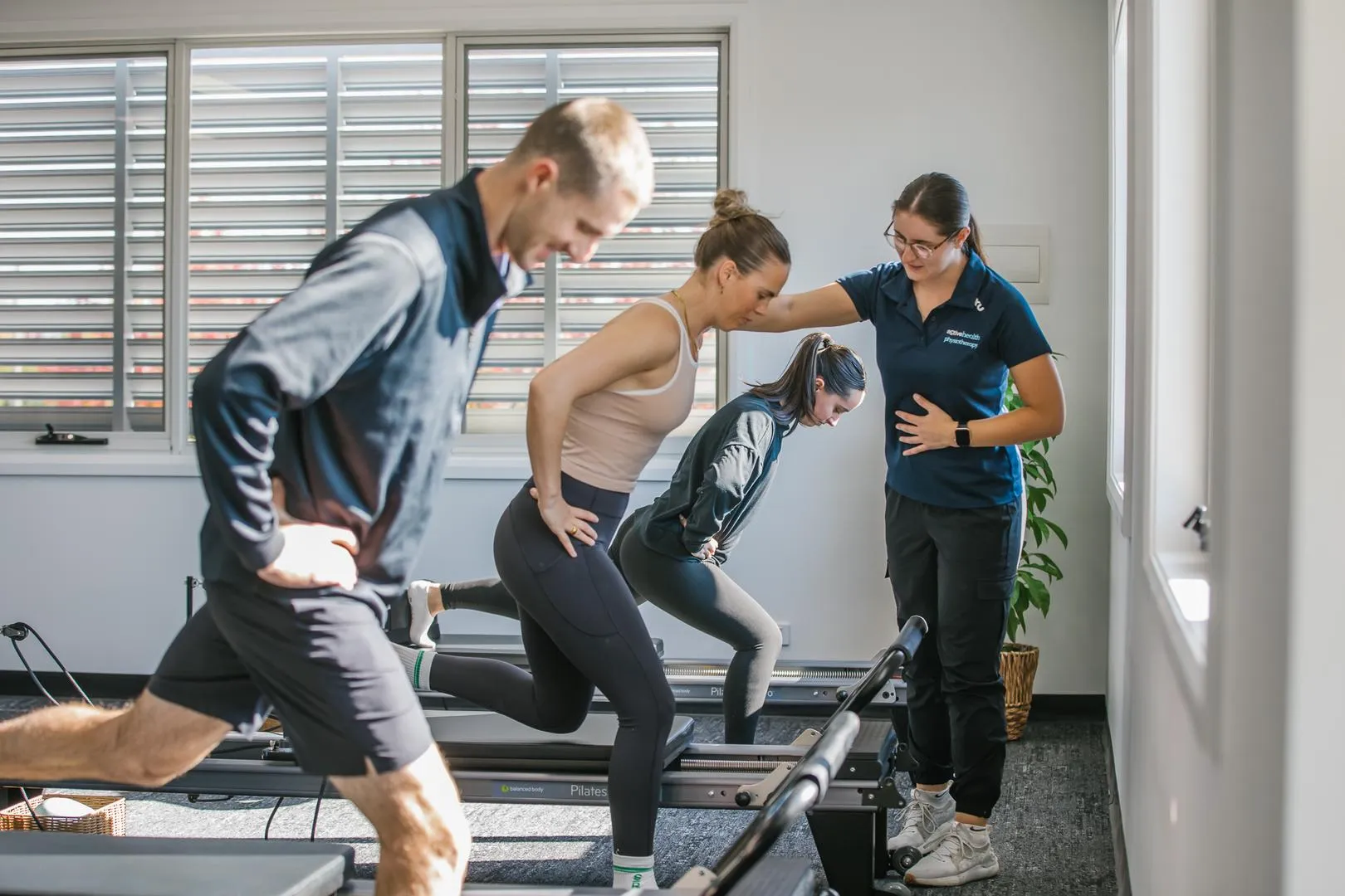 Participants in a spacious movement studio